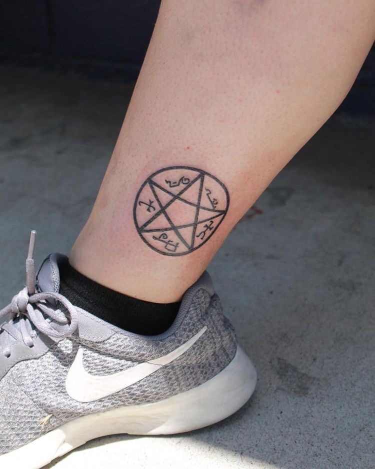 Dark Sun-Inspired Symbol Tattoo Design