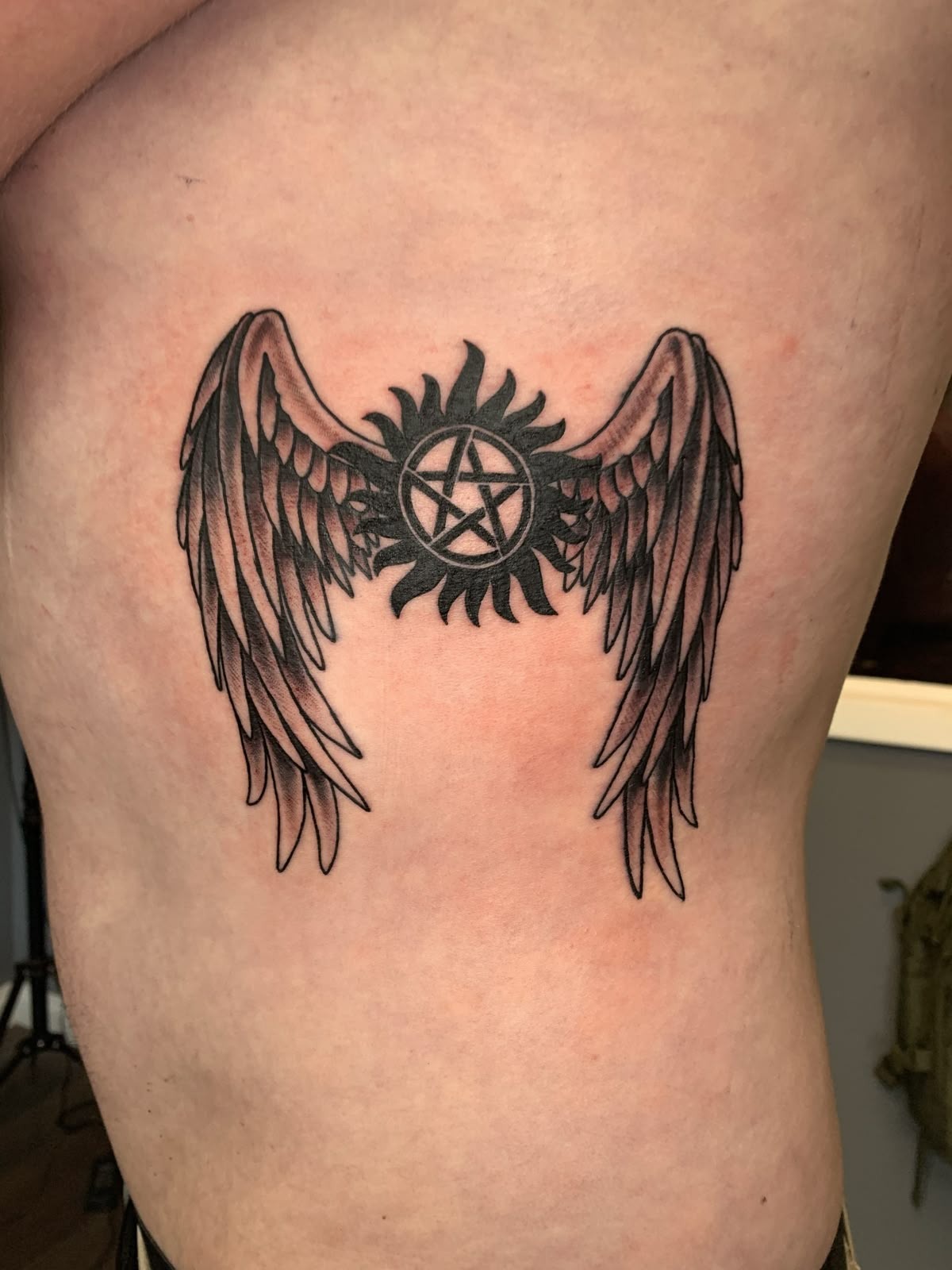 Tiny Shoulder Charm Tattoo Design
