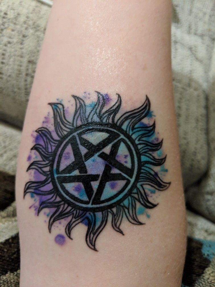 Wings and Symbol Tattoo Tattoo Design