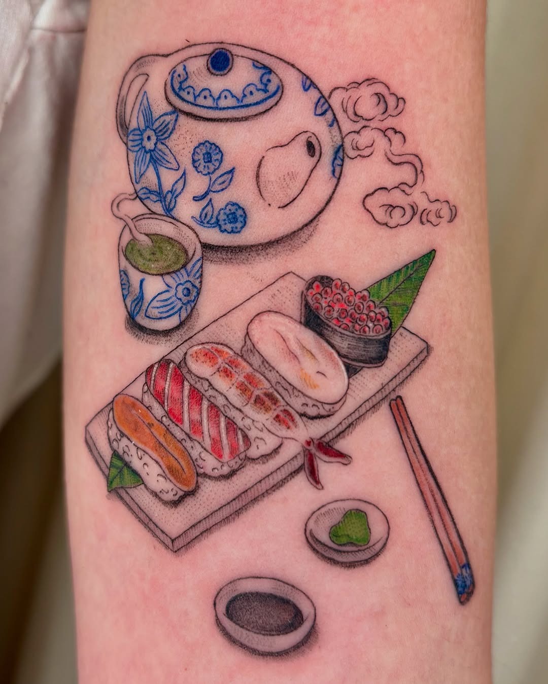 Charming sushi tattoo with tea and utensils Tattoo Design