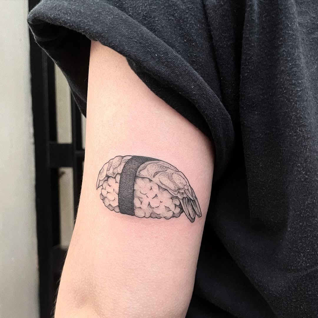 Stylish black line art sushi tattoo on arm Tattoo Design