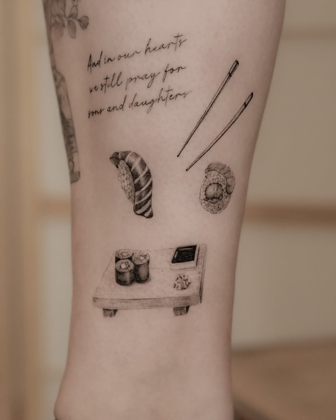 Stylish sushi tattoo with meaningful text Tattoo Design