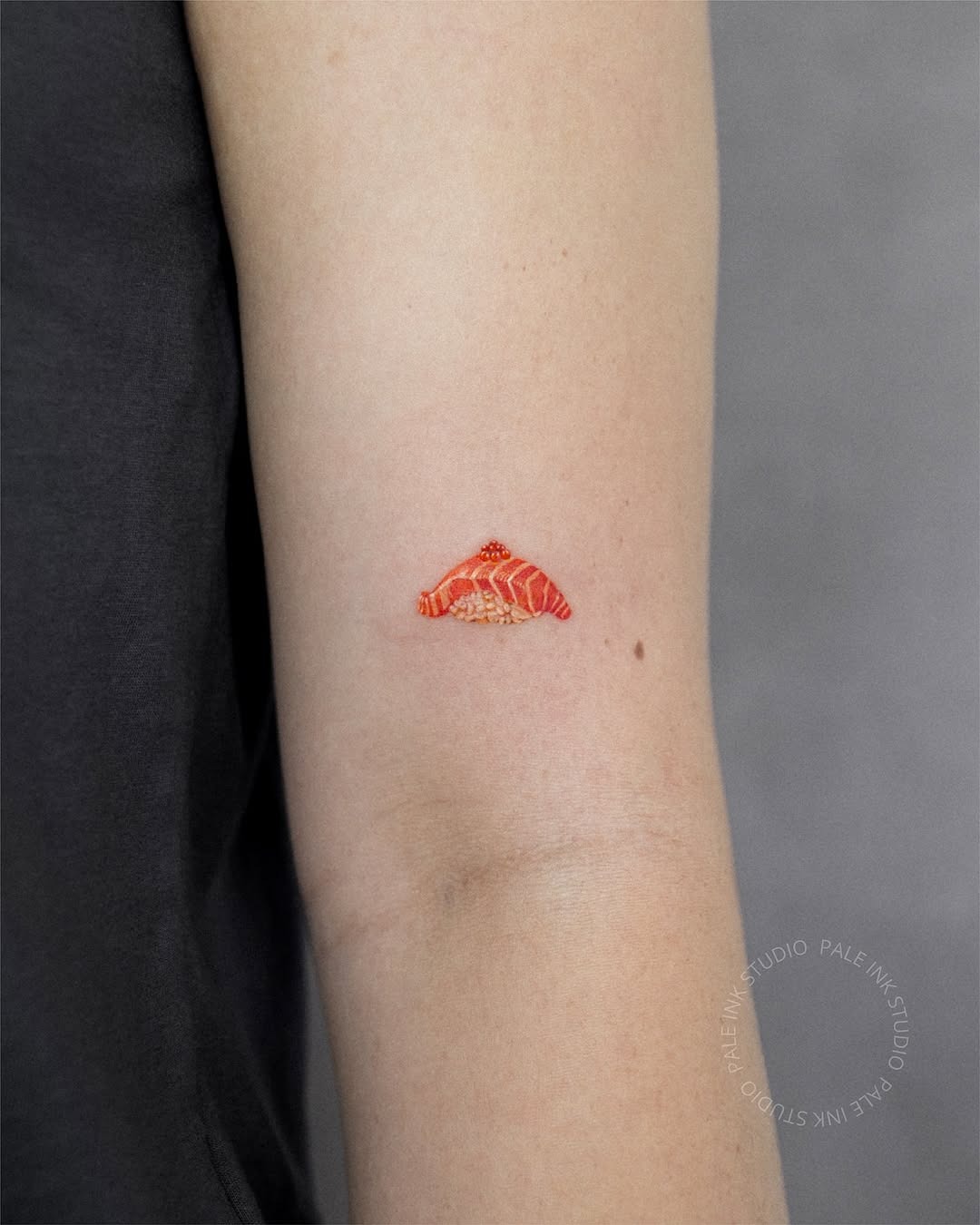 Vibrant sushi tattoo featuring salmonskin artistry Tattoo Design