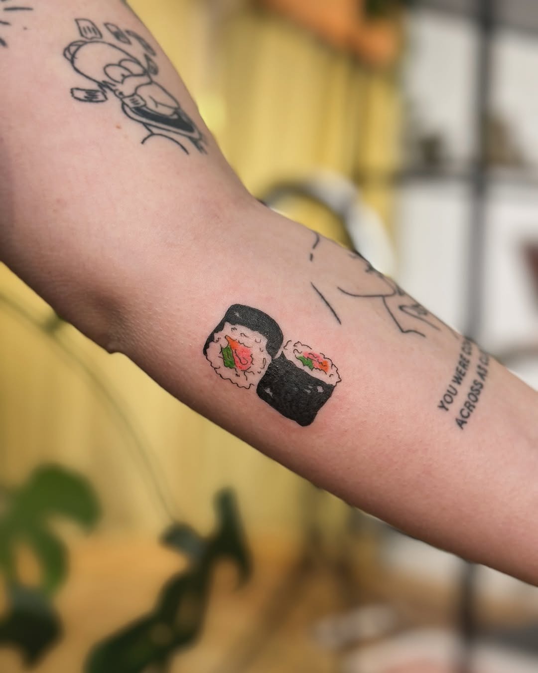 Whimsical sushi tattoo showcasing playful art style Tattoo Design