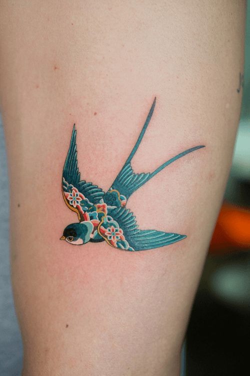 Blue Japanese-Inspired Floral Swallow Tattoo Design