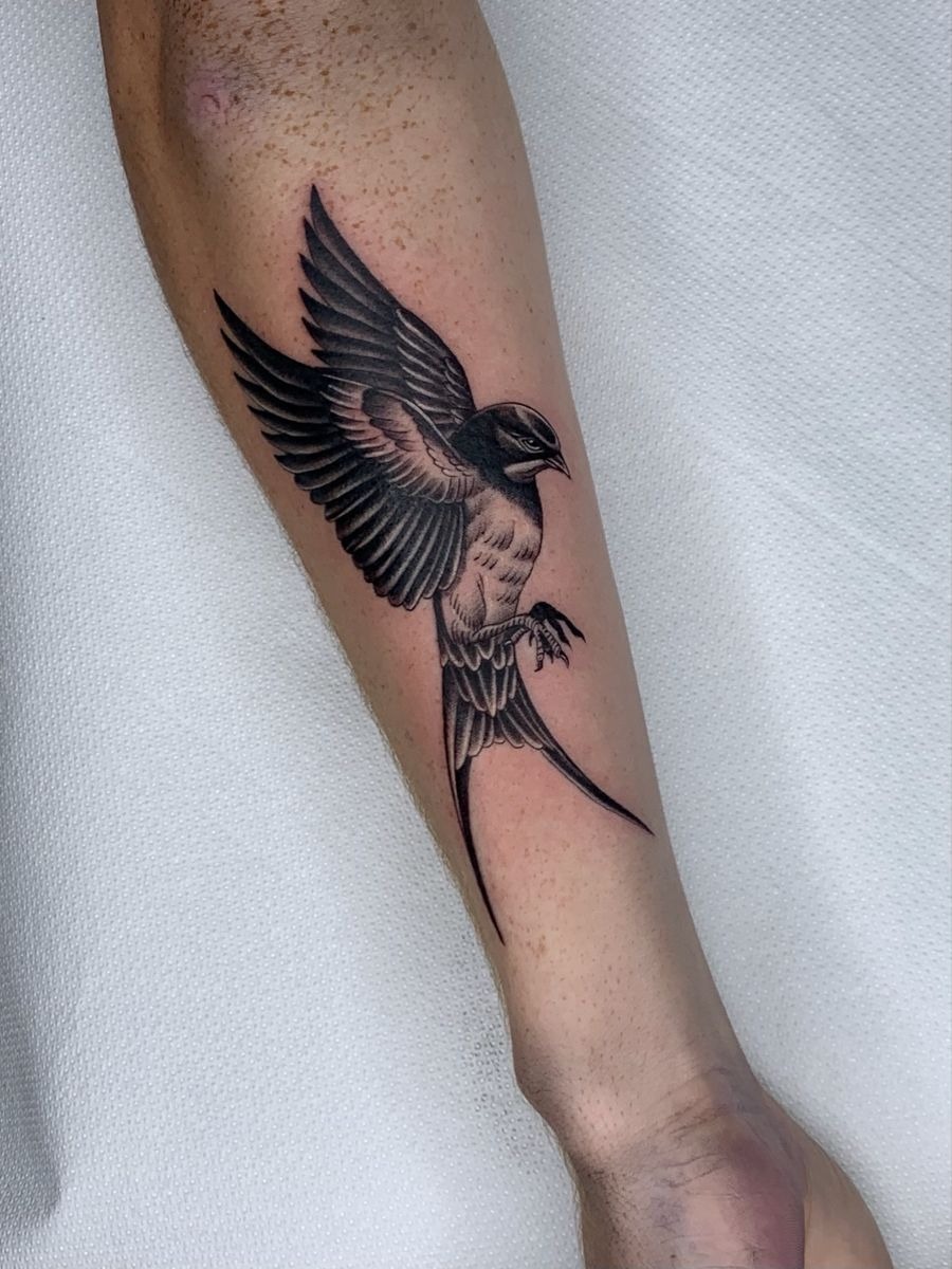 Detailed Black and Gray Swallow on the Forearm Tattoo Design