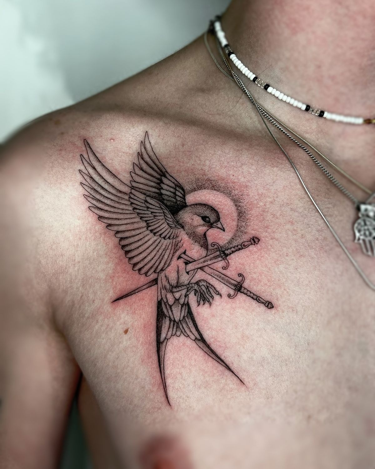Swallow With Crossed Swords Chest Tattoo Tattoo Design