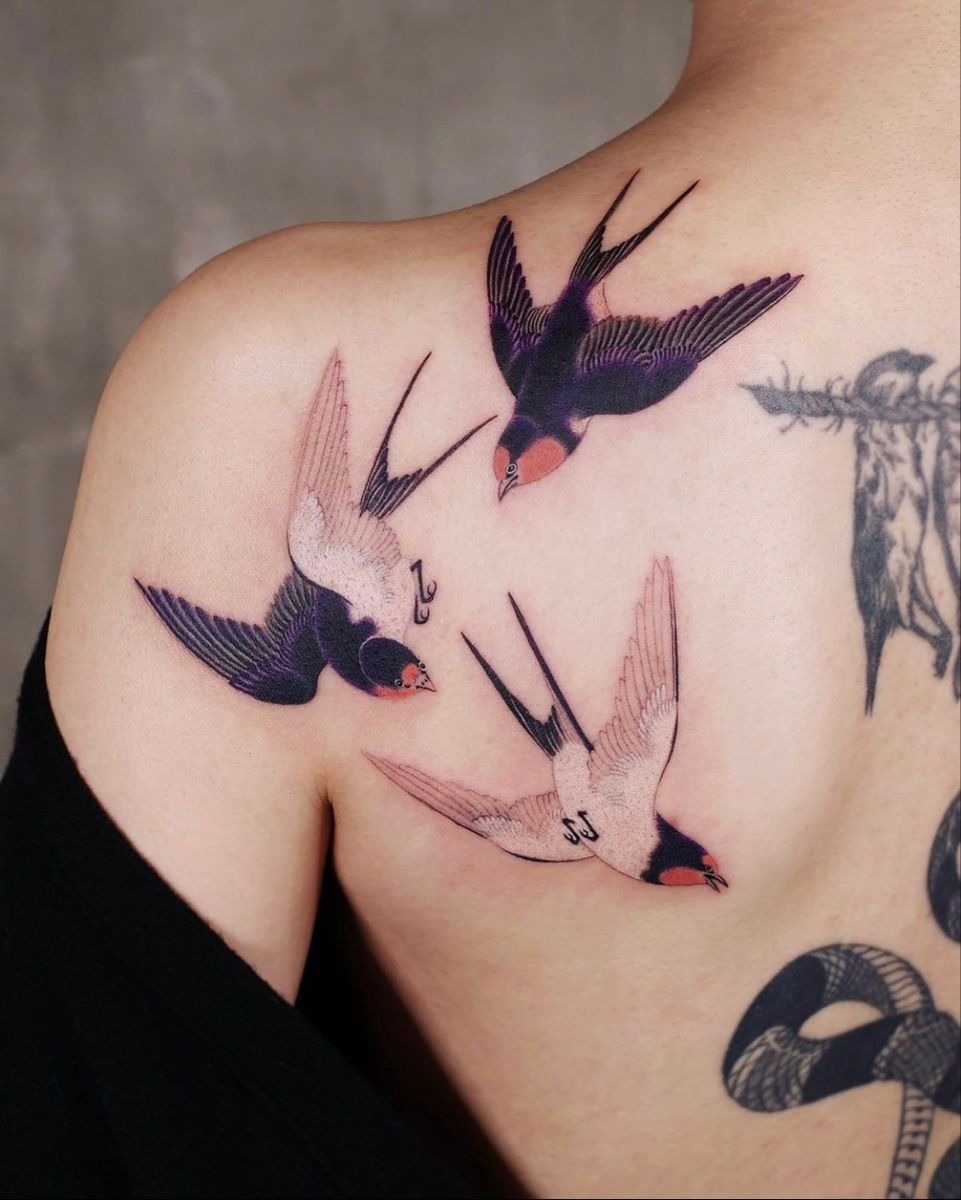 Three Traditional Swallows Across the Back Tattoo Design