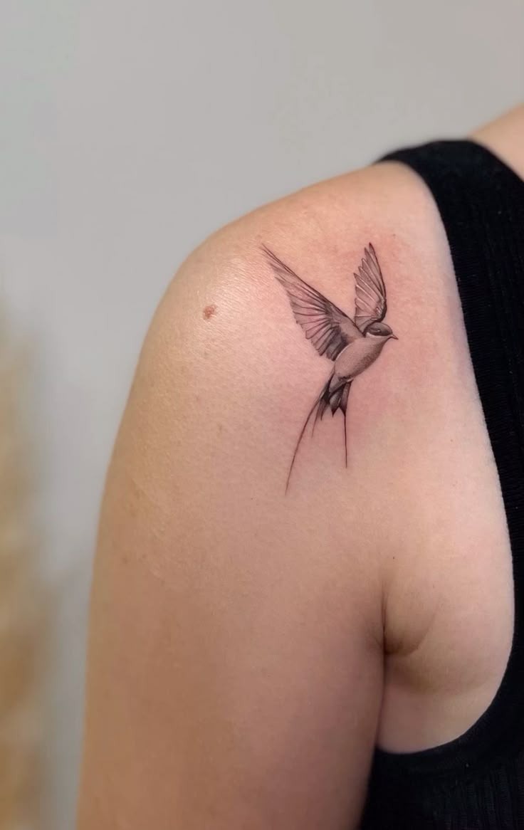 Tiny Fine Line Swallow on the Shoulder Tattoo Design