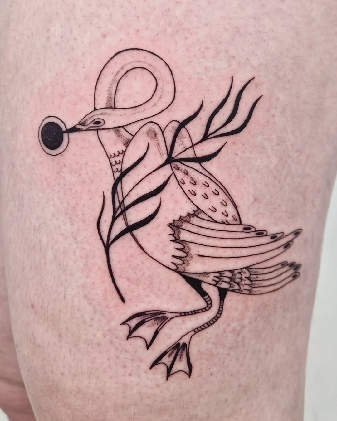 Elegant minimalist swan tattoo design with foliage Tattoo Design