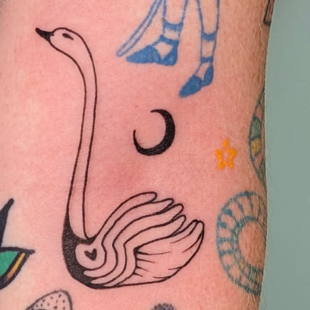 Elegant minimalist swan tattoo on forearm Tattoo Design