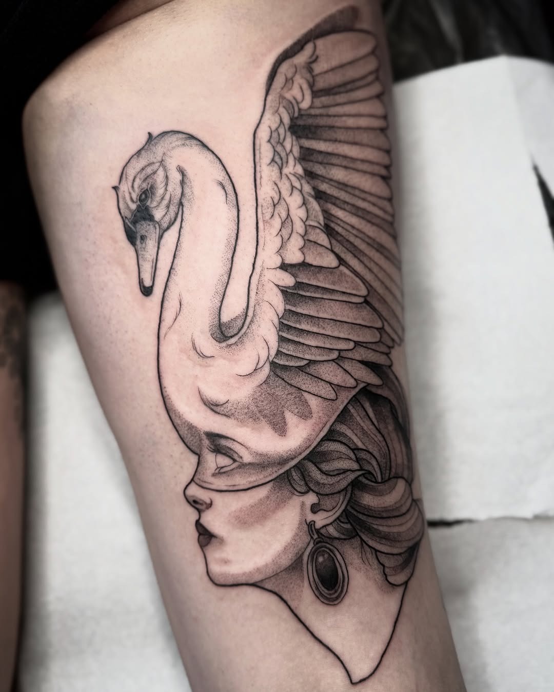 Elegant swan tattoo atop a serene woman’s head Tattoo Design