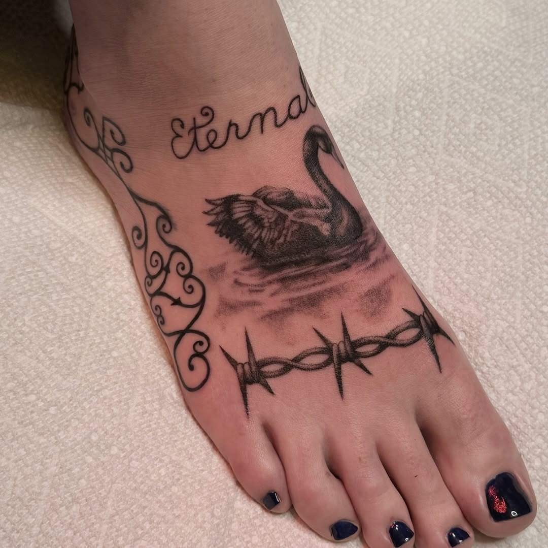 Elegant swan tattoo with a touch of eternity Tattoo Design