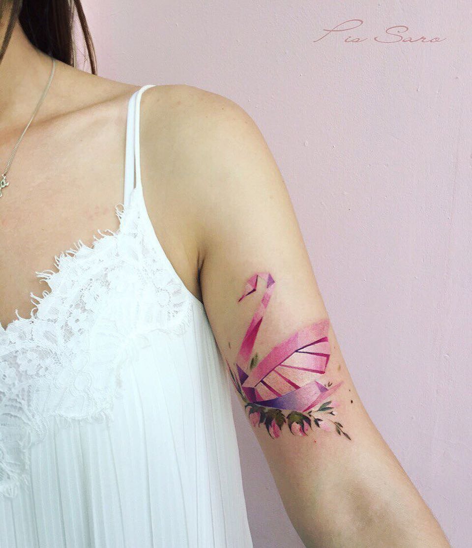 Elegantly colored swan tattoo with floral accent Tattoo Design