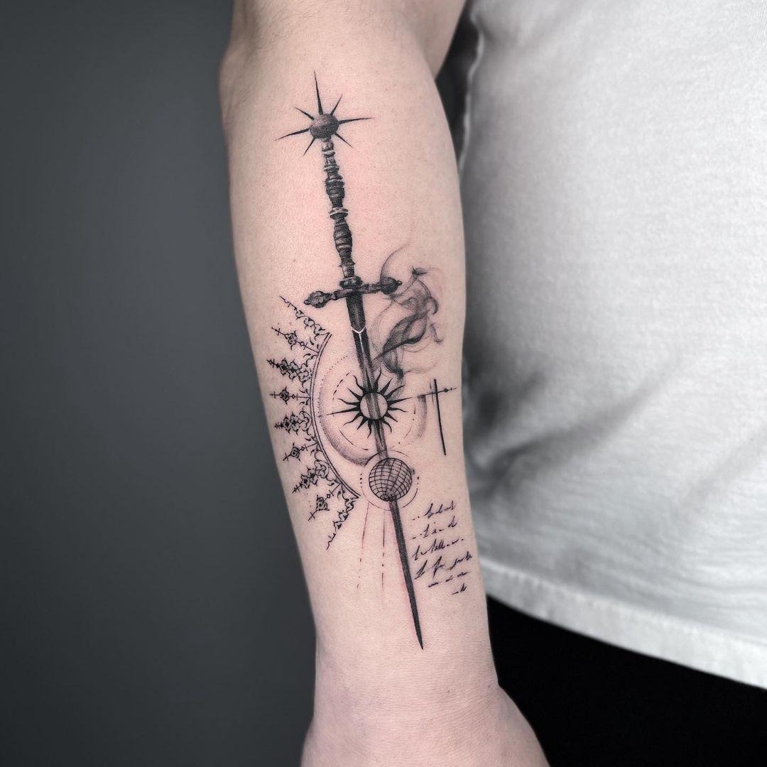 A striking sword tattoo with celestial elements Tattoo Design