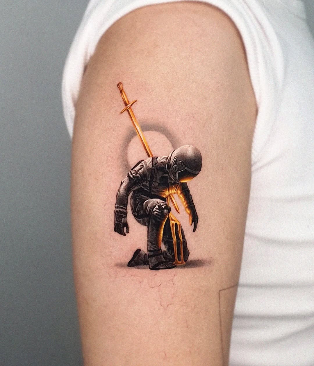 Intricate sword tattoo with a unique character Tattoo Design
