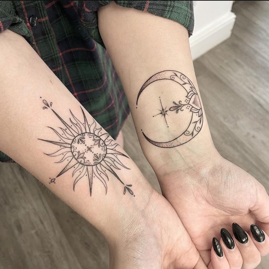 Vibrant Sun and Moon Forearm Tattoo Tattoo Design