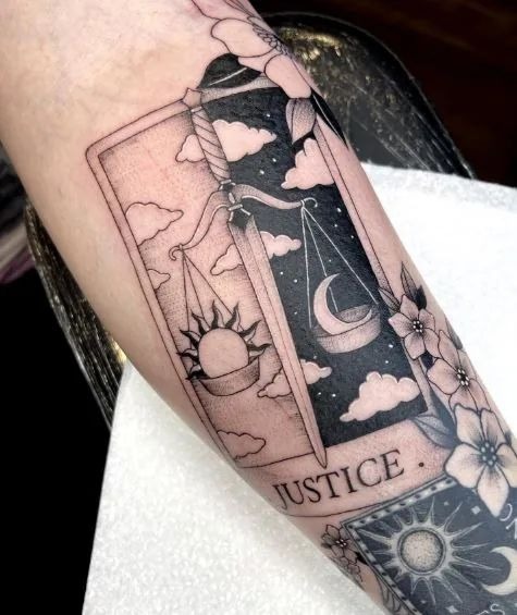Justice with Sun and Moon Scales Tattoo Design