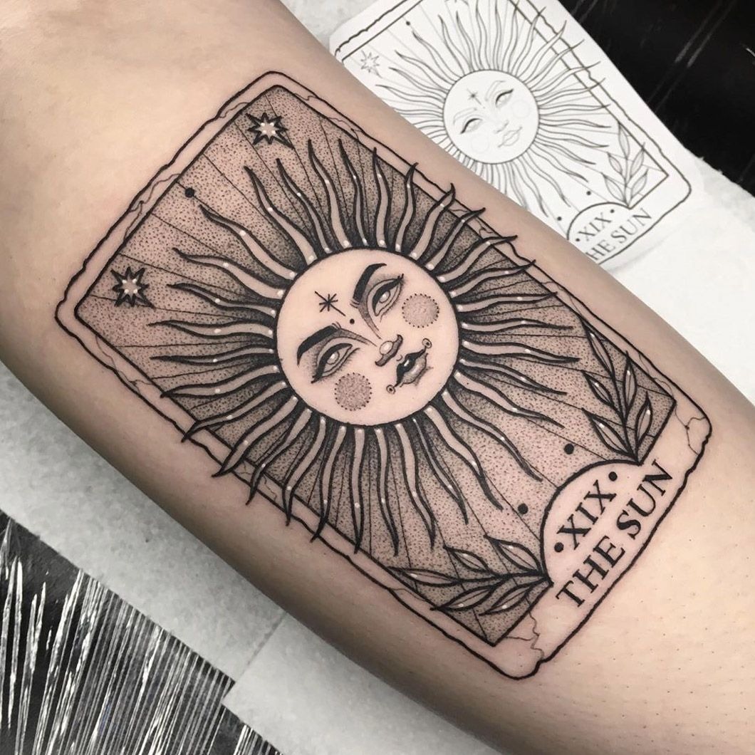 The Sun with Folklore Face Tattoo Design
