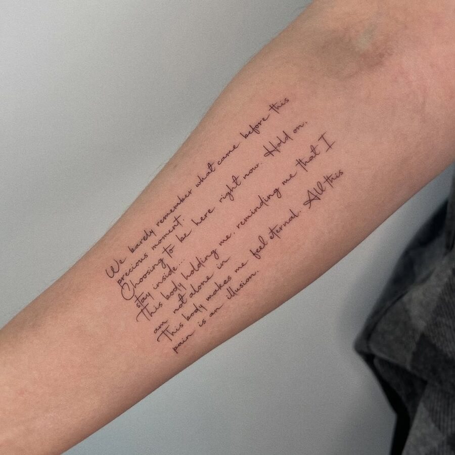 Elegant handwritten quote tattoo on forearm Tattoo Design