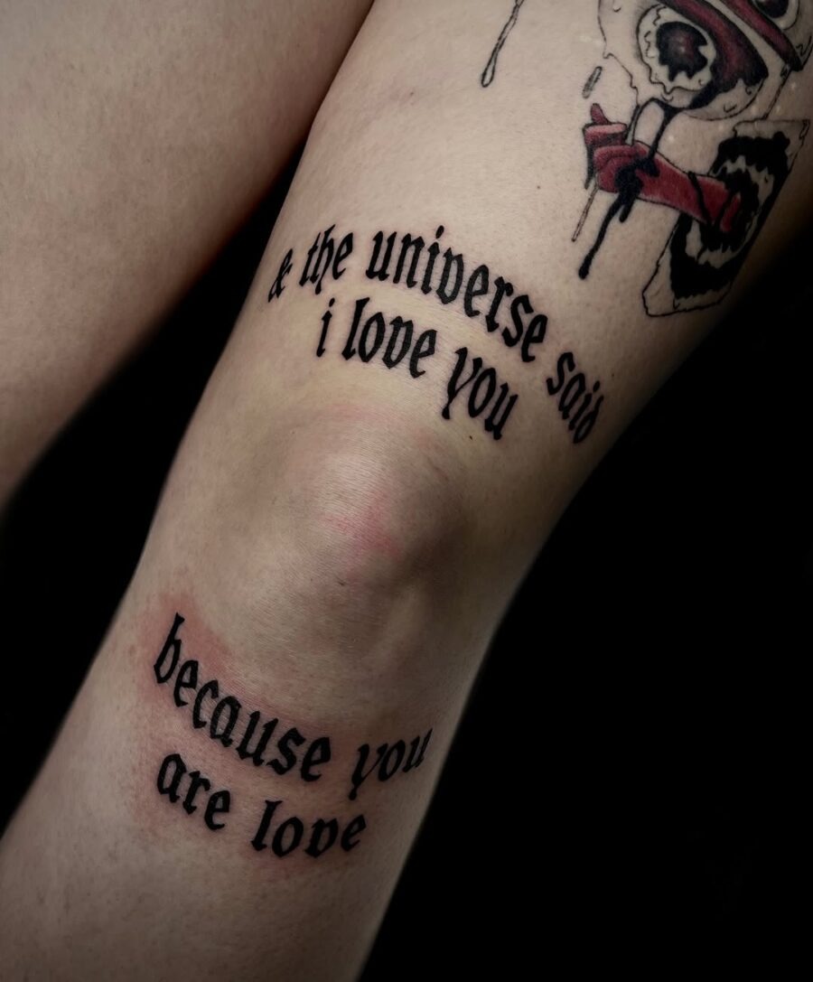 Elegant script tattoo expressing love's essence Tattoo Design