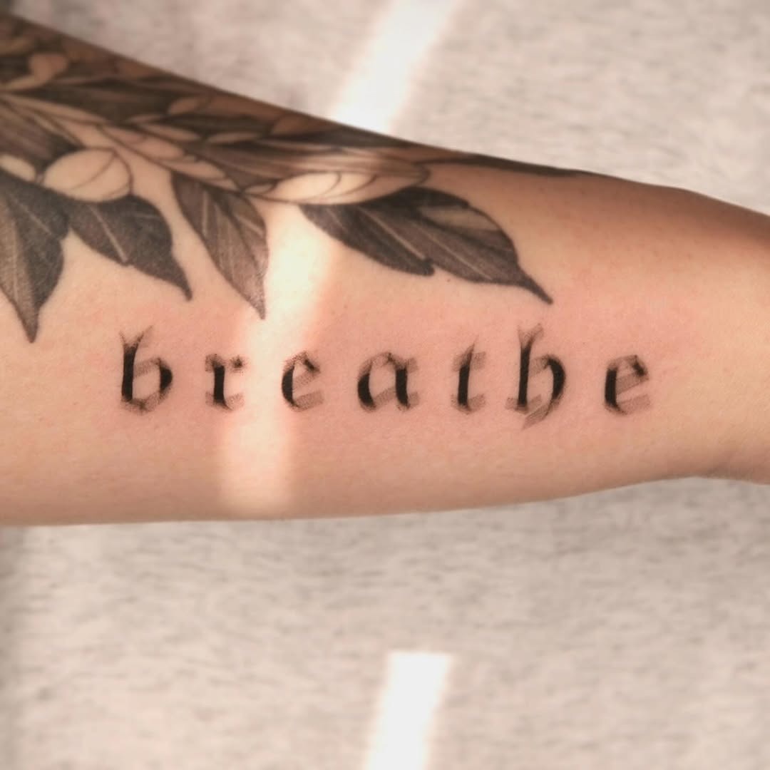 Elegant script tattoo promoting mindfulness and calmness Tattoo Design