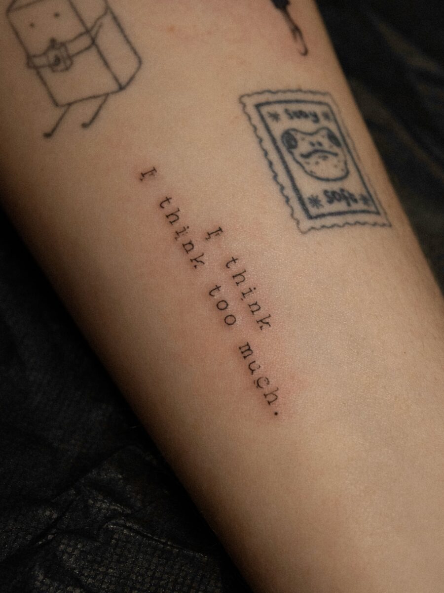 Elegant script tattoo showcasing thoughtful expression Tattoo Design
