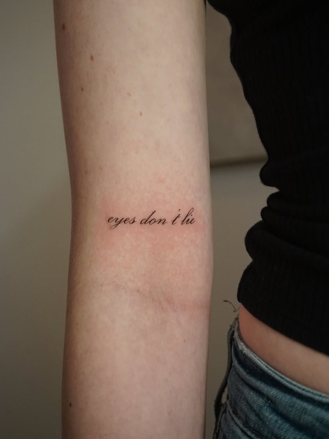 Elegant script tattoo with powerful wording Tattoo Design