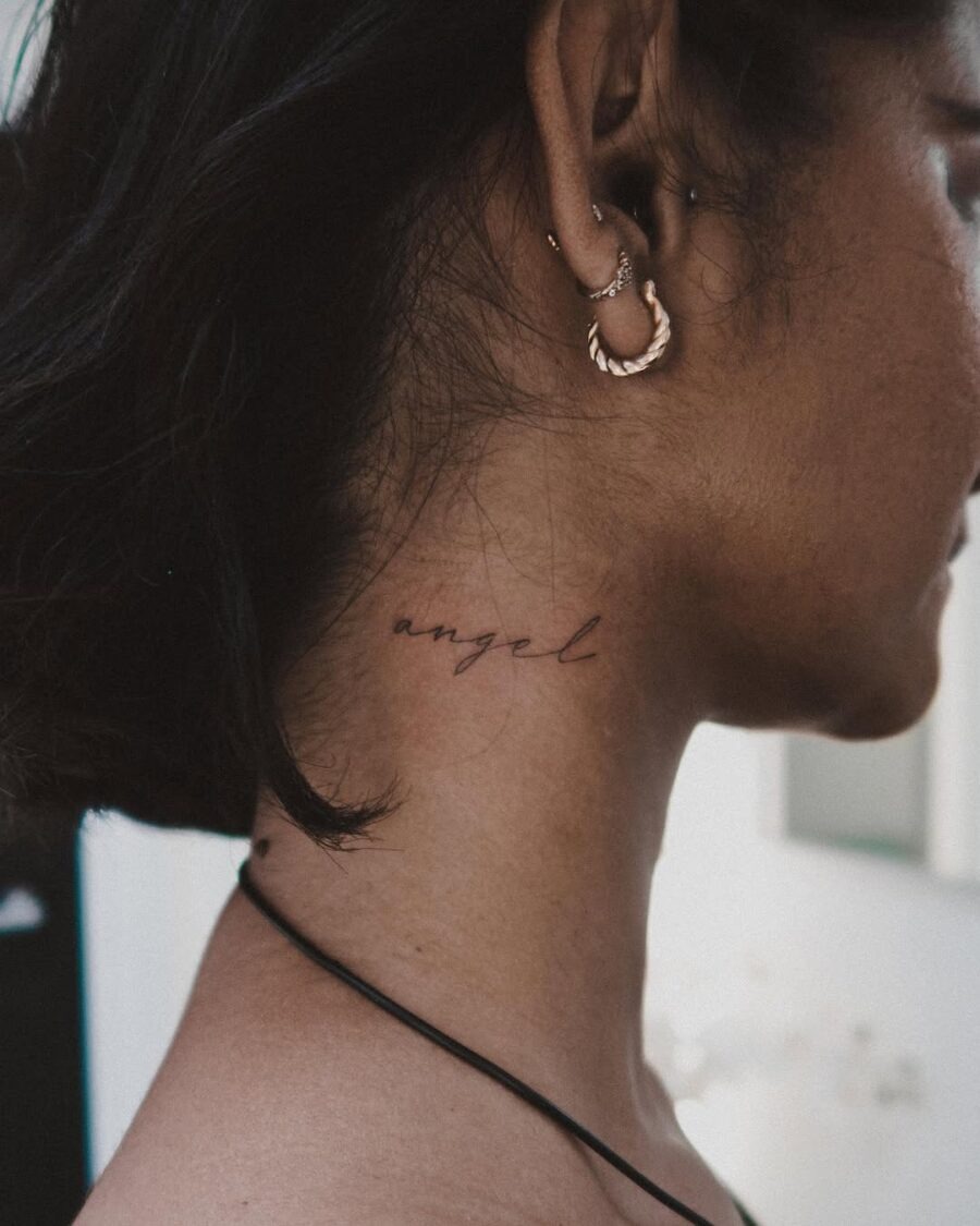 Elegant script tattoo with the word 'angel' Tattoo Design
