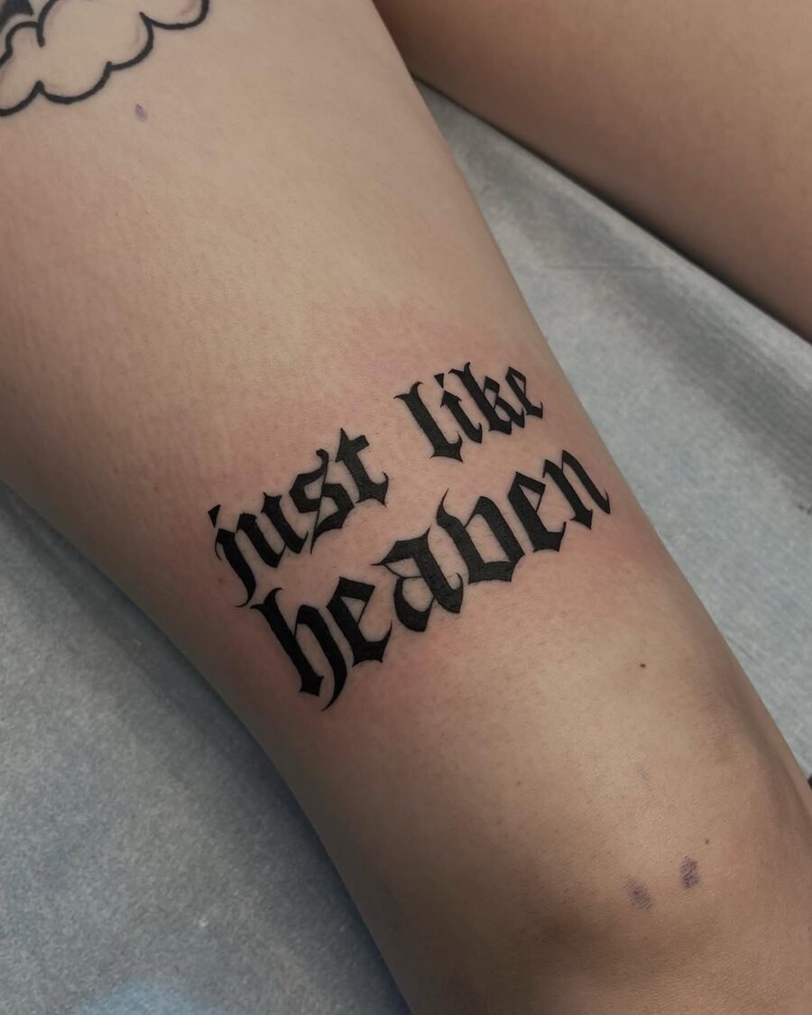 Sleek cursive tattoo pays tribute to bliss Tattoo Design