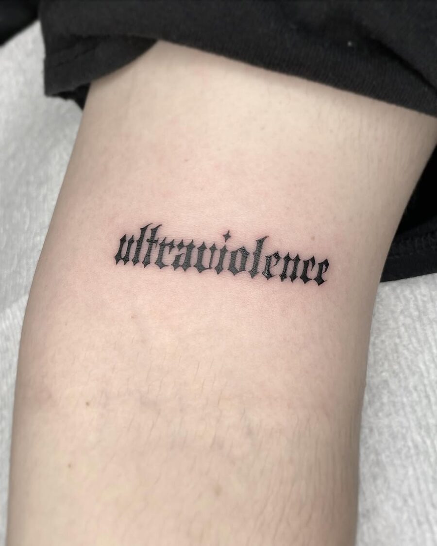 Stunning blackletter tattoo showcasing ultraviolence Tattoo Design