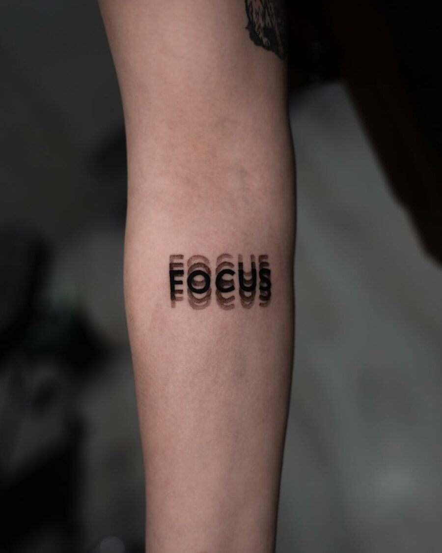 Stylish and modern focus tattoo design Tattoo Design