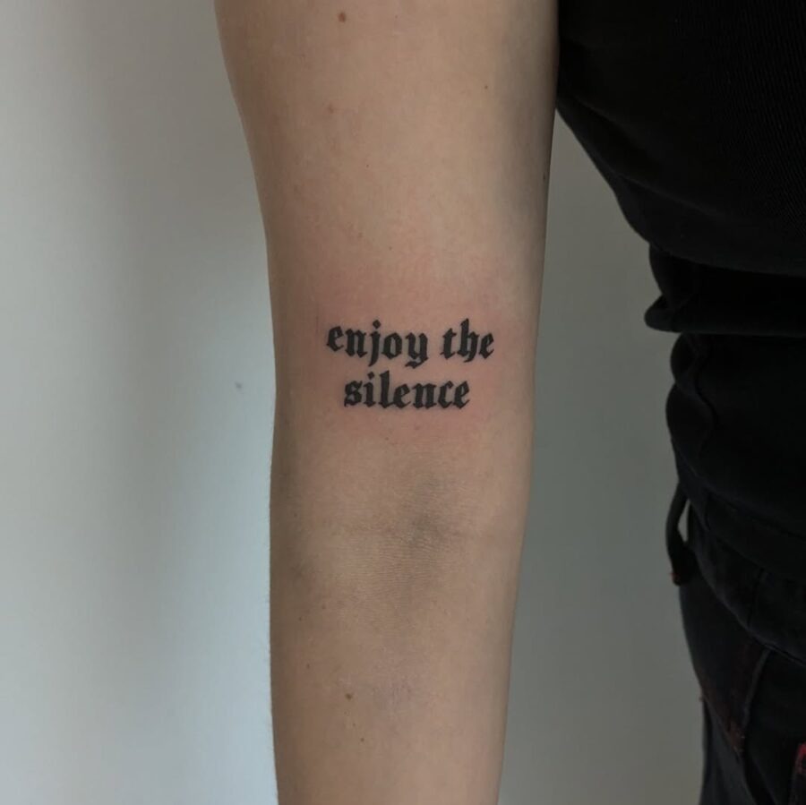 Stylish tattoo featuring a powerful phrase Tattoo Design