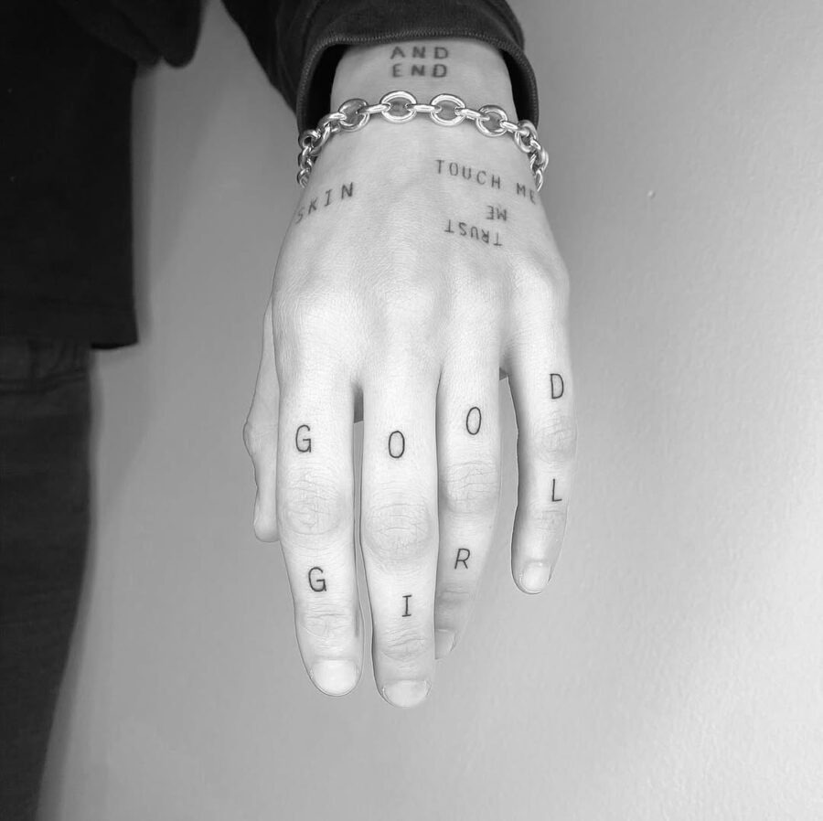 Unique Hand Tattoos with Bold Text Tattoo Design