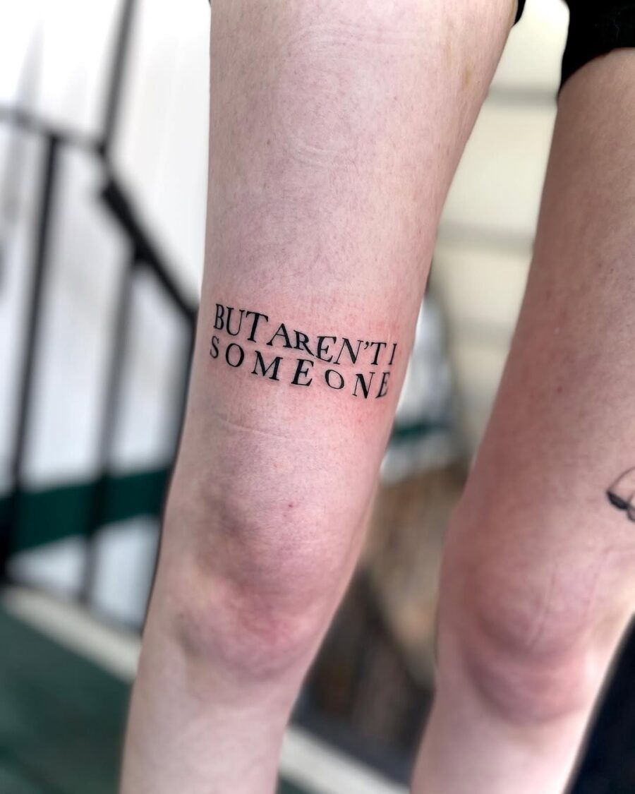Unique Text Tattoo with a Playful Phrase Tattoo Design