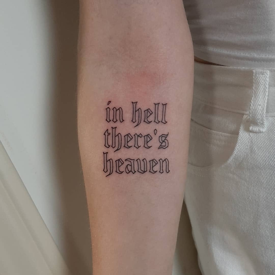Unique Text Tattoo with Contrasting Themes Tattoo Design