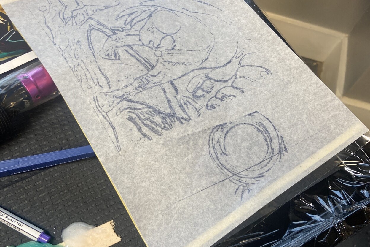 Tattoo artwork transferred onto stencil paper, an example of tattoo stencil paper in use