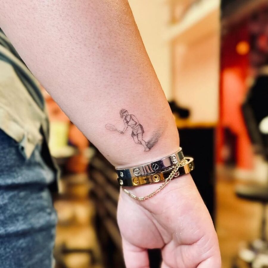 Dynamic tennis player tattoo in action Tattoo Design