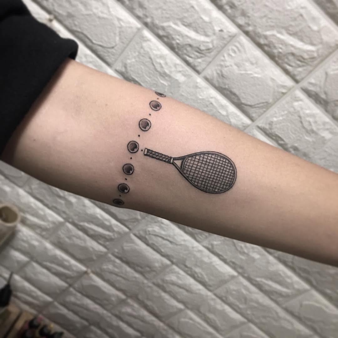 Stylish tennis racket tattoo on forearm Tattoo Design