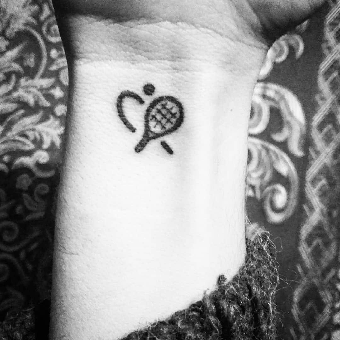 Unique tennis love tattoo on wrist Tattoo Design