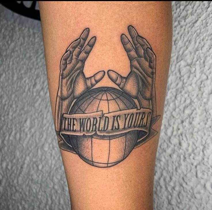 Hands Framing the Globe Tattoo Design
