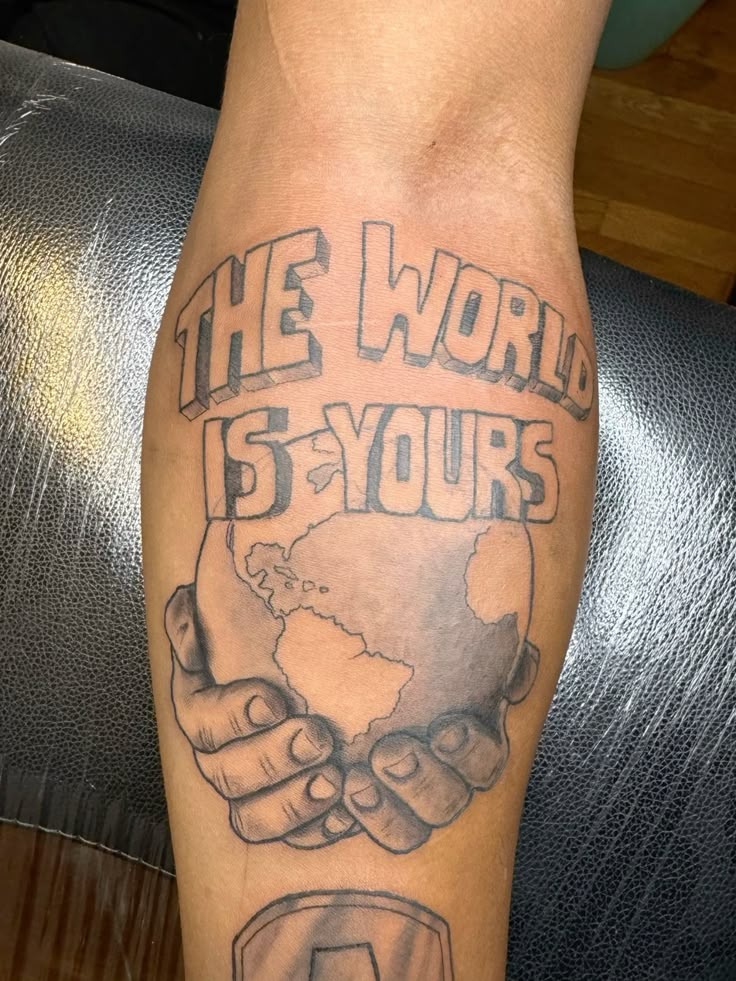 Holding the Globe Calf Tattoo Tattoo Design