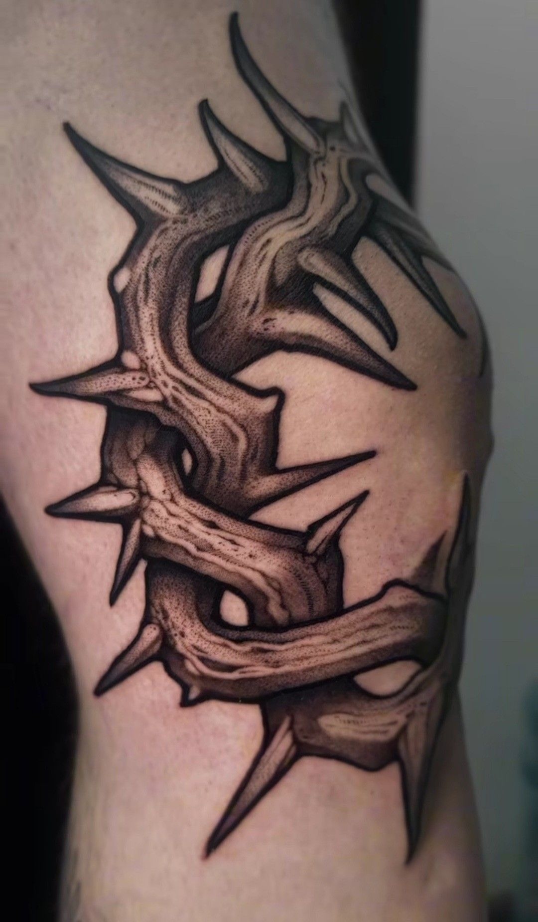 Bold Black Thorn Cluster for Maximum Impact, a tattoo design rendered in clean detailed linework for the arm.