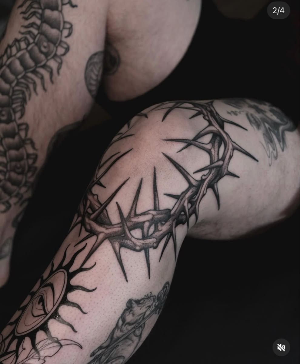 Crown of Thorns Elbow Piece With Intense Symbolism, a tattoo design rendered in clean detailed linework.