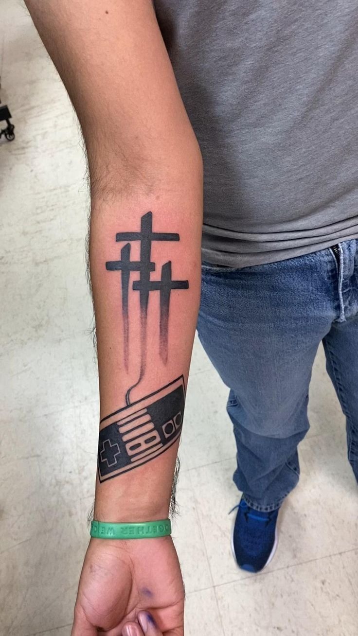 Bold Inner Forearm Three Cross Tattoo Tattoo Design