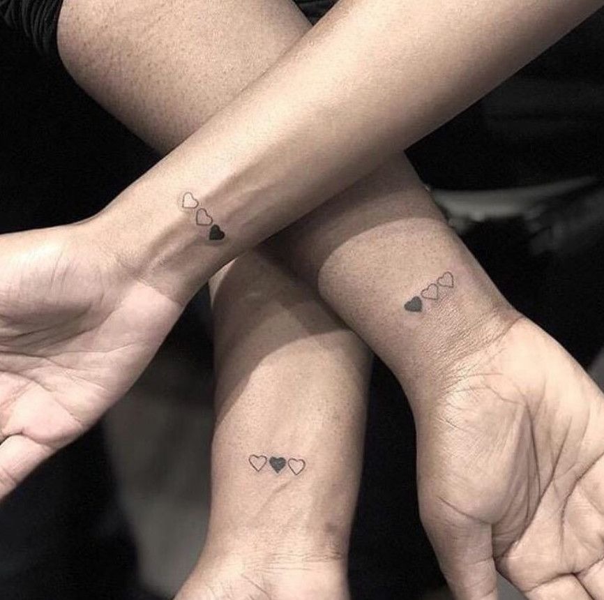 Coordinated Heart Tattoo with a Stylish Twist Tattoo Design
