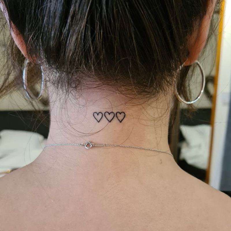 Delicate Three Hearts Tattoo on the Nape Tattoo Design