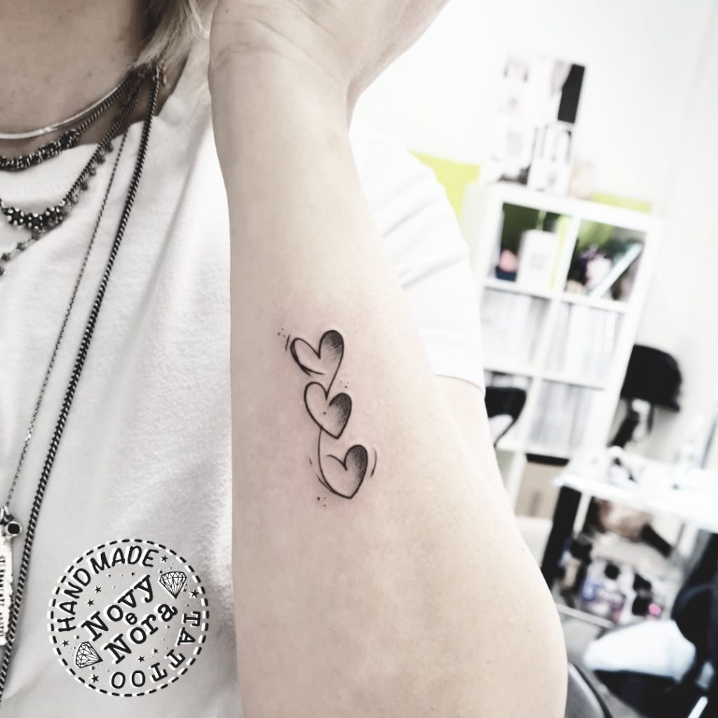 Gradient Shading Three Hearts Tattoo on the Arm Tattoo Design