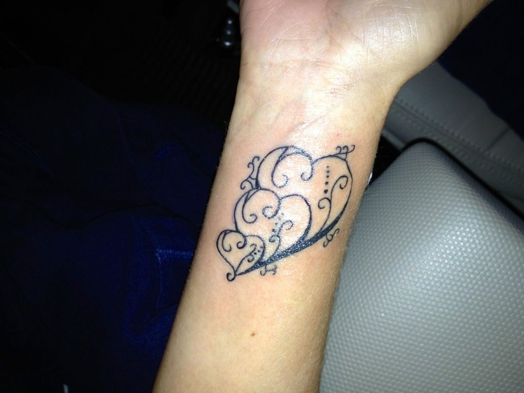 Intricately Designed Three Hearts Tattoo Tattoo Design