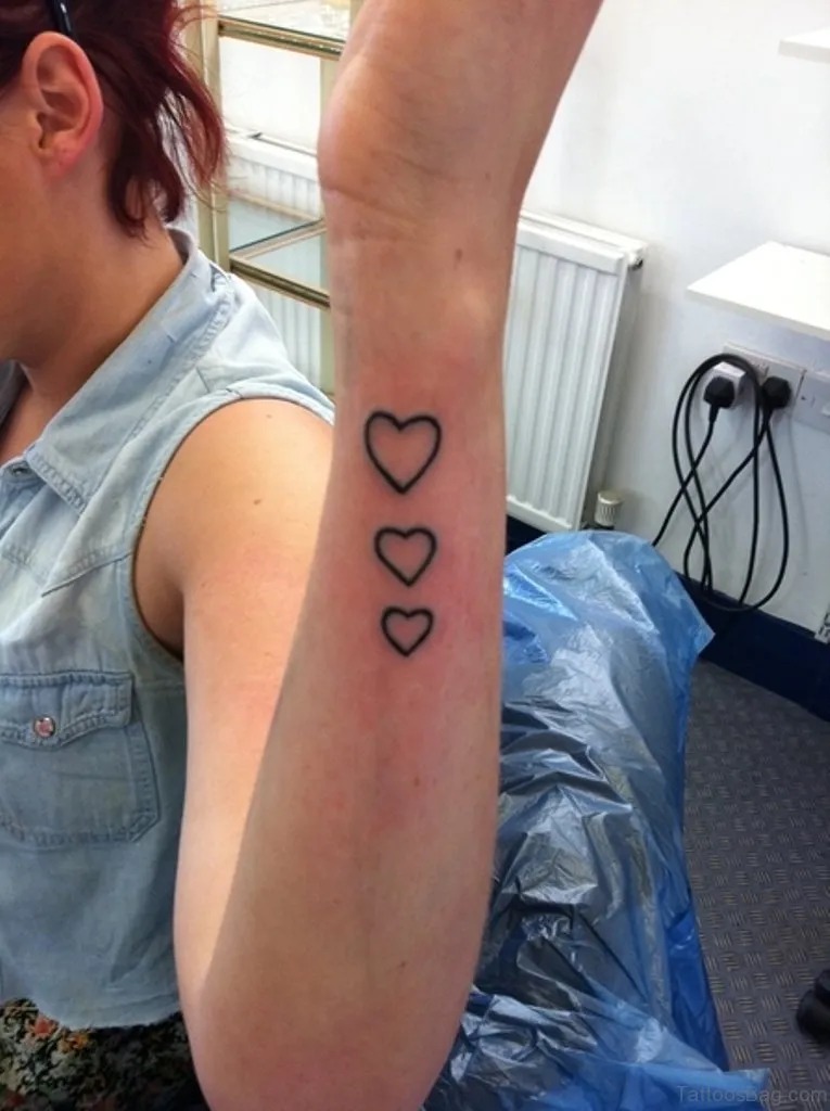 Simple and Minimalist Arm Three Hearts Tattoo Tattoo Design